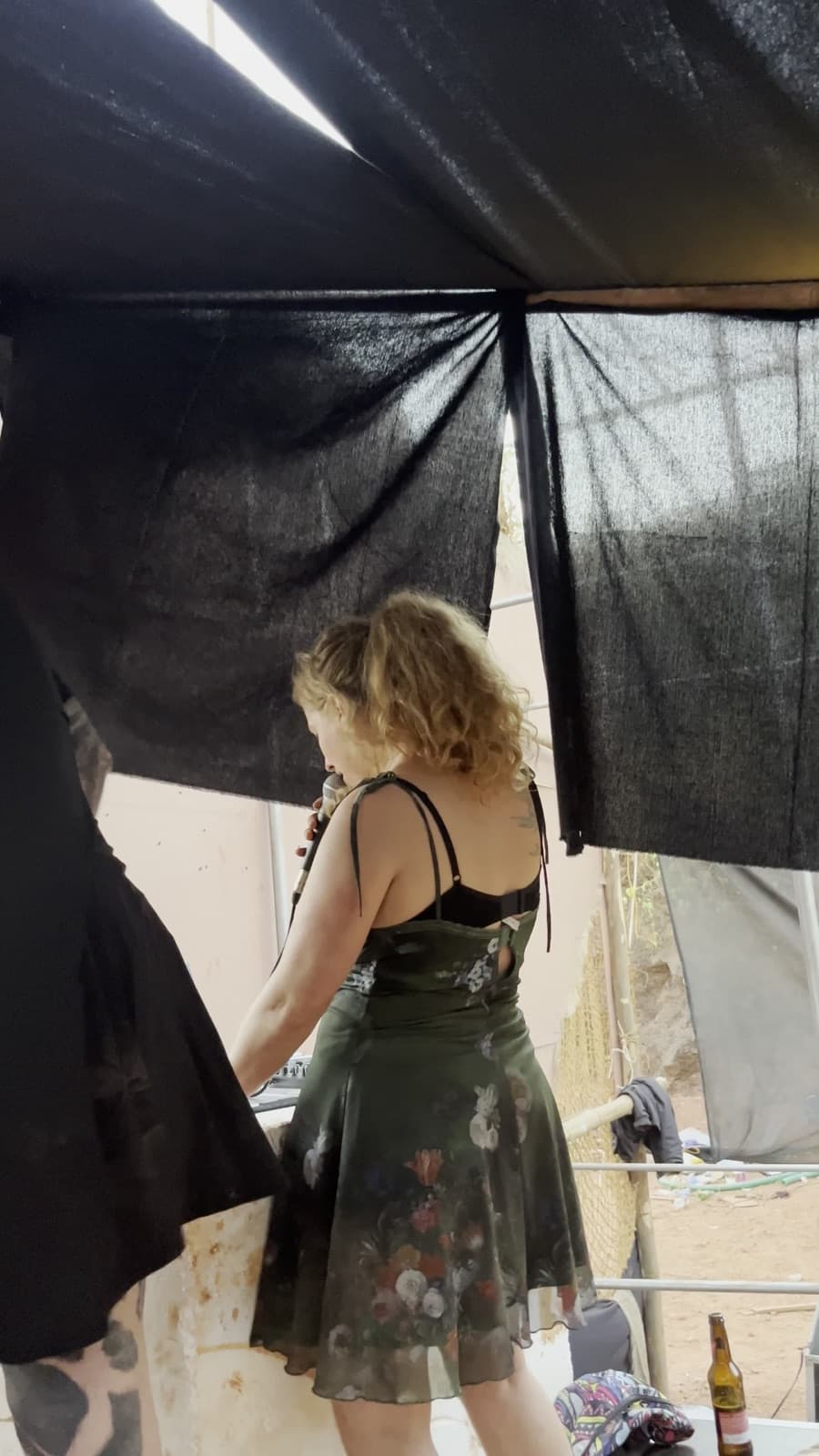 Performer in the booth with a microphone